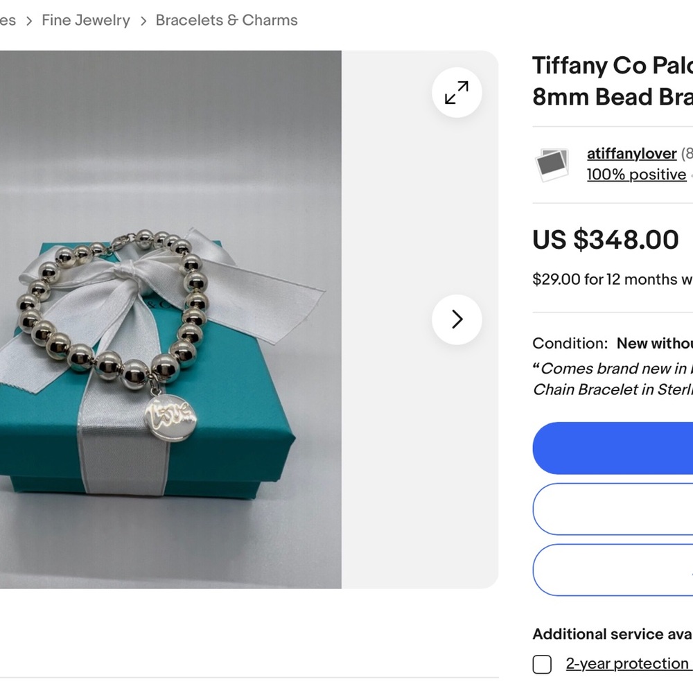 Tiffany &Co. bead bracelet with love charm